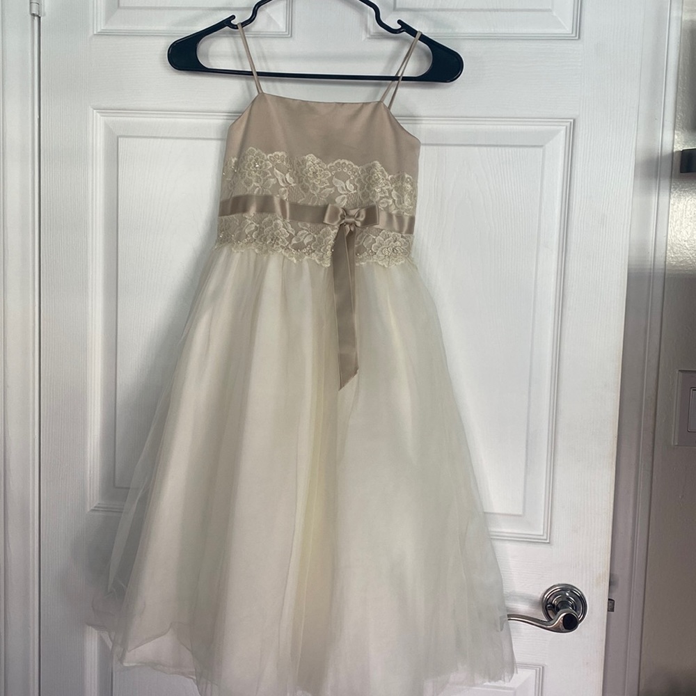 Davids bridal flower girl dress. Spaghettini straps crystals, stain and tulle